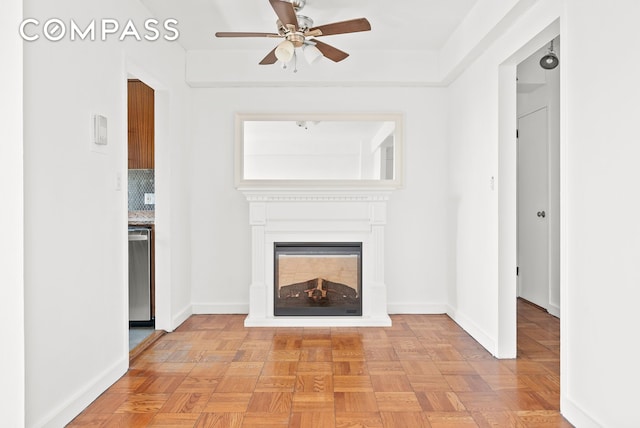 345 W 145th St Unit 8C3, New York City, NY 10031 - unfurnished living room featuring ceiling fan, a fireplace, and baseboards