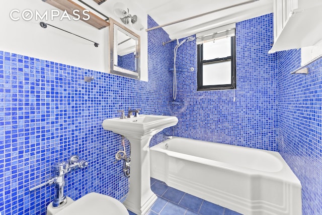 345 W 145th St Unit 8C3, New York City, NY 10031 - full bathroom with tile walls, tile patterned floors, and shower / bathtub combination