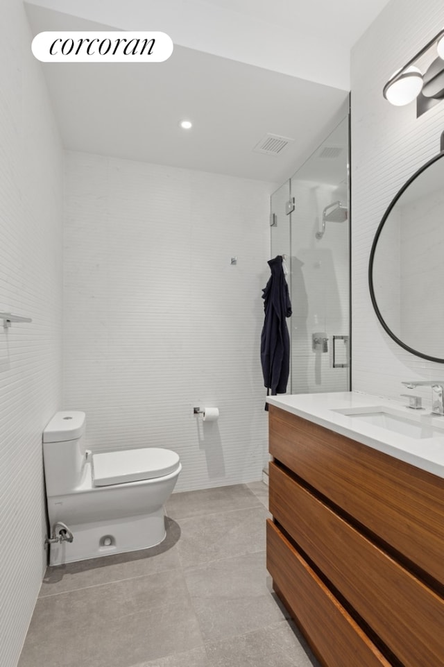 112 Fleet Pl Unit 2A, New York City, NY 11201 - full bathroom with vanity, a shower stall, and tile patterned flooring