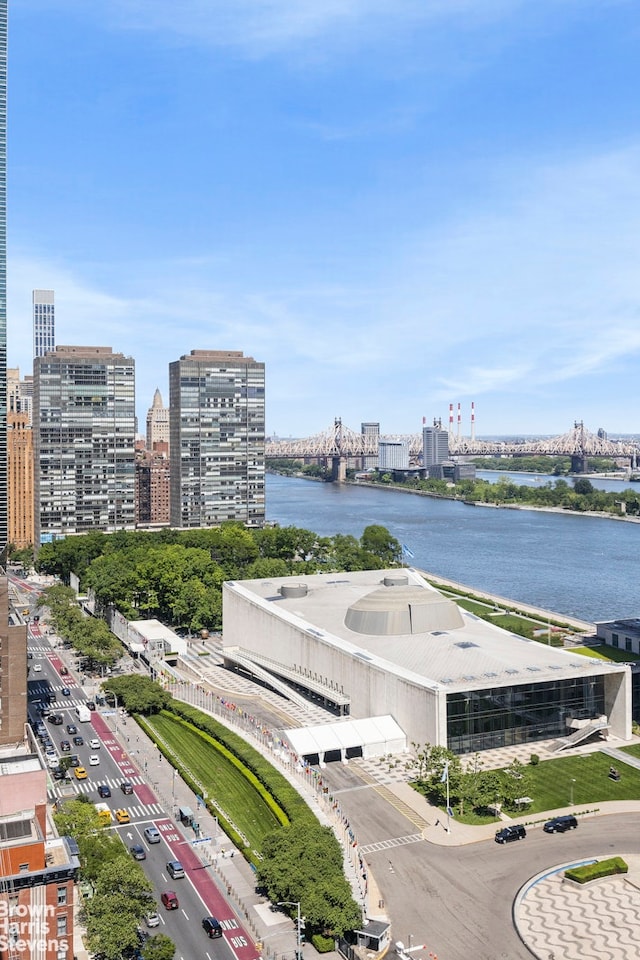 25 Tudor City Pl Unit 2101, New York City, NY 10017 - view of urban area with a notable bridge and a nearby body of water