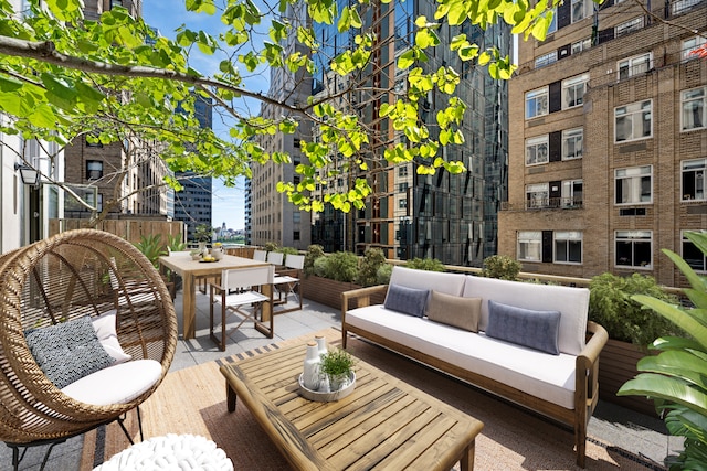 99 John St Unit 1405, New York City, NY 10038 - view of patio with outdoor dining space and outdoor lounge area