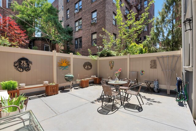 459 Vanderbilt Ave, New York City, NY 11238 - fenced backyard with a patio