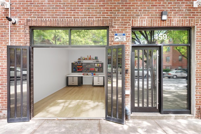 459 Vanderbilt Ave, New York City, NY 11238 - property entrance with brick siding and a surveillance system