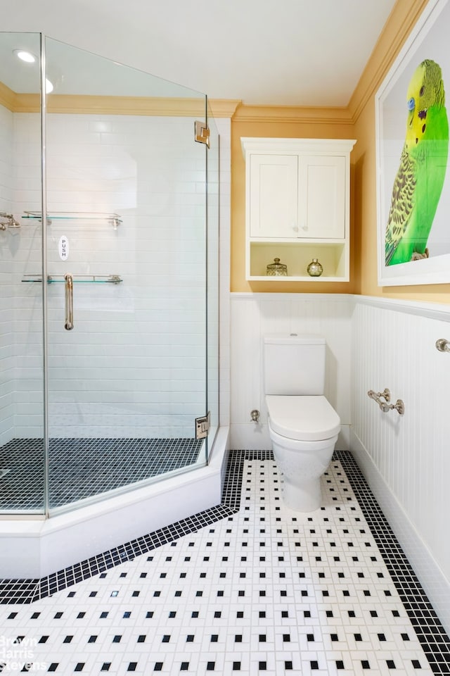 2 Beekman Pl Unit 5Ag, New York City, NY 10022 - full bath featuring a shower stall, wainscoting, and ornamental molding