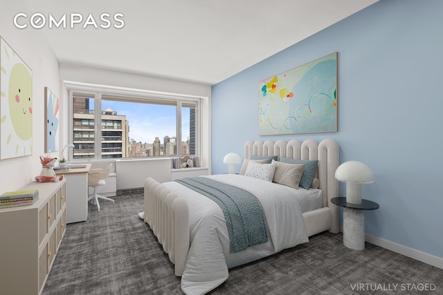 303 E 57th St Unit 33Ef, New York City, NY 10022 - bedroom with carpet, a city view, and baseboards