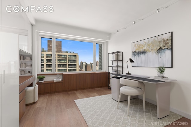 303 E 57th St Unit 33Ef, New York City, NY 10022 - office featuring light wood-type flooring