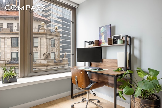 75 Wall St Unit 25K, New York City, NY 10005 - office area featuring baseboards