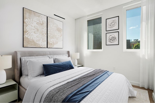128 Woodpoint Rd Unit 2, New York City, NY 11211 - bedroom featuring wood finished floors and baseboards