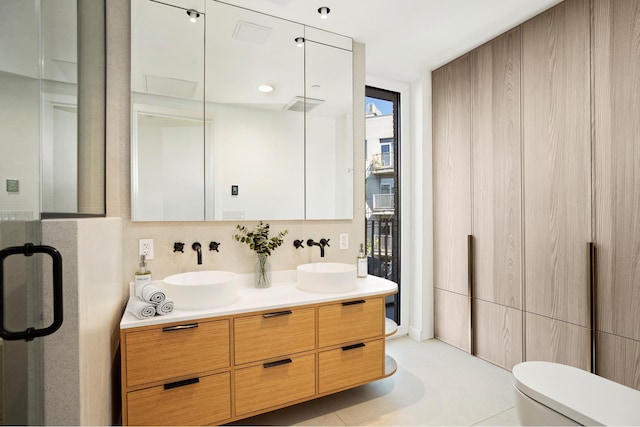 128 Woodpoint Rd Unit 2, New York City, NY 11211 - full bath featuring double vanity and toilet