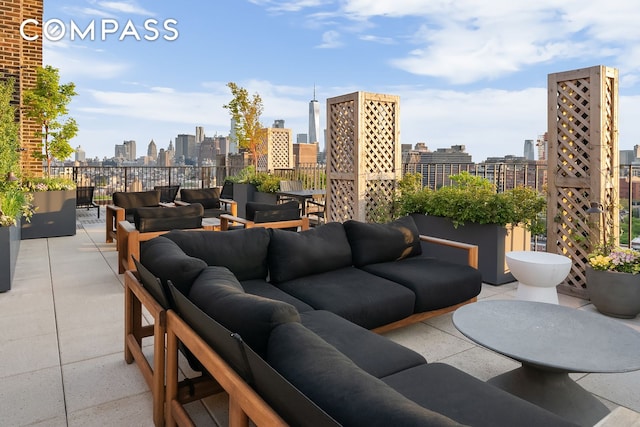 45 Christopher St Unit 12/14F, New York City, NY 10014 - view of patio with a skyline view and an outdoor hangout area