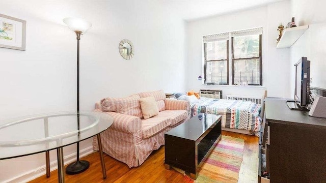 448 E 84th St Unit 1B, New York City, NY 10028 - bedroom featuring wood finished floors