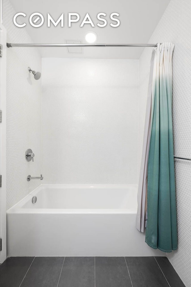 195 Hawthorne St Unit 5E, New York City, NY 11225 - bathroom featuring tile patterned flooring and shower / bathtub combination with curtain