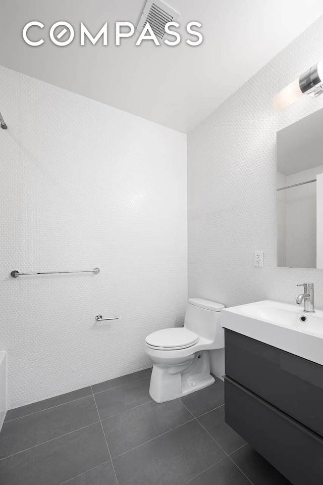 195 Hawthorne St Unit 5E, New York City, NY 11225 - full bath featuring vanity, toilet, and tile patterned floors
