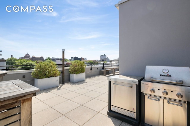 195 Hawthorne St Unit 5E, New York City, NY 11225 - view of patio with area for grilling and a view of city
