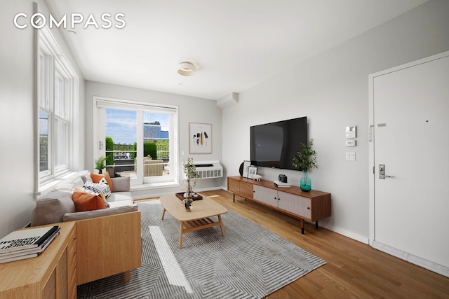 195 Hawthorne St Unit 5E, New York City, NY 11225 - living room featuring wood finished floors