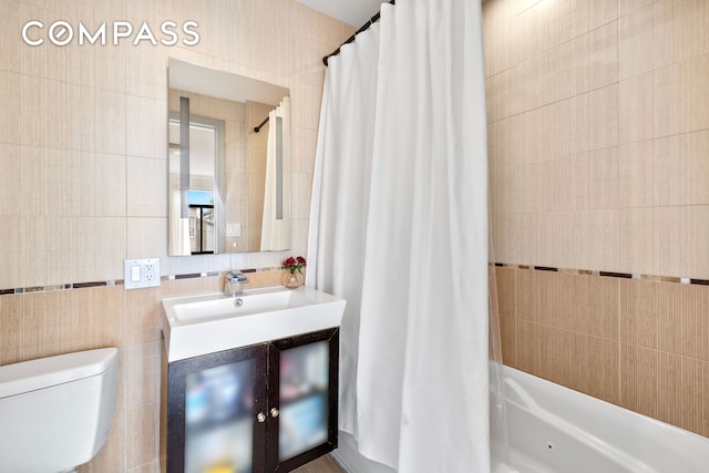 3001 Fort Hamilton Pkwy Unit 3B, New York City, NY 11218 - full bathroom with tile walls, vanity, shower / tub combo, and toilet