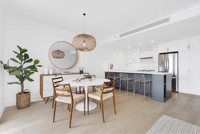 133 Bch 116th St Tha, Unit Tha, New York City, NY 11694 - dining space with light wood-type flooring and recessed lighting