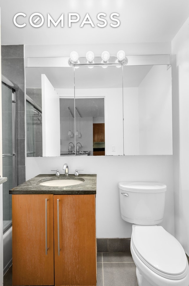 242 E 25th St Unit 5B, New York City, NY 10010 - full bath featuring toilet, vanity, and combined bath / shower with glass door