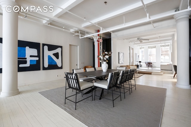 32 W 20th St Unit 5, New York City, NY 10011 - dining area with ornate columns, ceiling fan, and wood finished floors