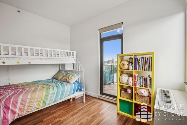 1610 Dekalb Ave Unit 5A, New York City, NY 11237 - bedroom with wood finished floors and baseboards