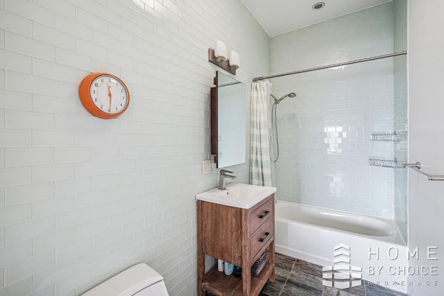 1610 Dekalb Ave Unit 5A, New York City, NY 11237 - bathroom with shower / bath combo with shower curtain, tile walls, vanity, and toilet