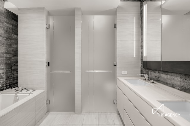 70 Charlton St Unit 4F, New York City, NY 10014 - bathroom with double vanity and a garden tub