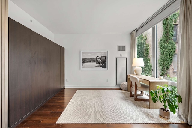 130 W 19th St Unit 4F, New York City, NY 10011 - home office with dark wood-style floors