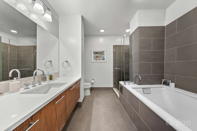 130 W 19th St Unit 4F, New York City, NY 10011 - full bath with vanity, tile patterned flooring, a bath, toilet, and a shower stall