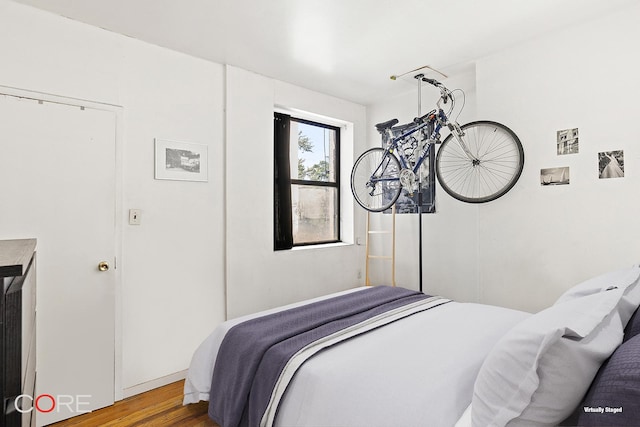 105 E 100th St Unit 4B, New York City, NY 10029 - bedroom with wood finished floors