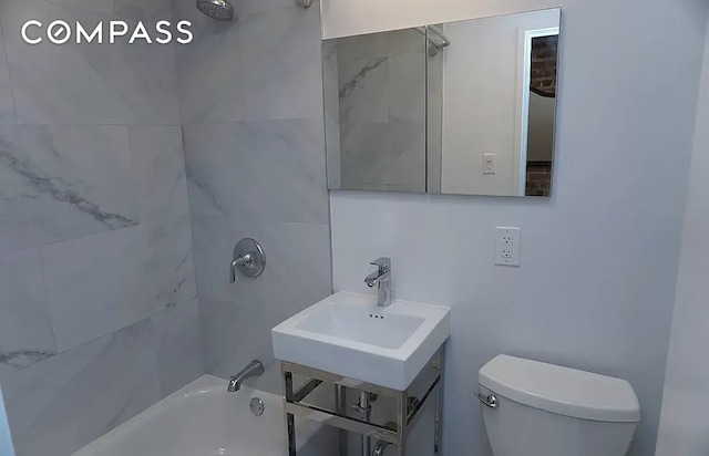223 W 14th St Unit 1B, New York City, NY 10011 - full bathroom with bathing tub / shower combination, toilet, and a sink