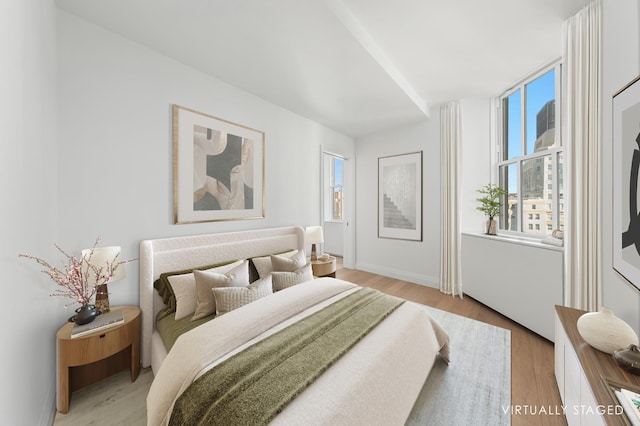 1 Wall St Unit 3606, New York City, NY 10005 - bedroom featuring light wood finished floors and baseboards