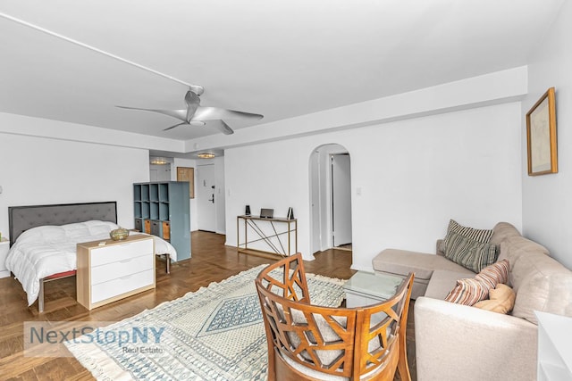 200 E 36th St Unit 13A, New York City, NY 10016 - bedroom featuring arched walkways and ceiling fan