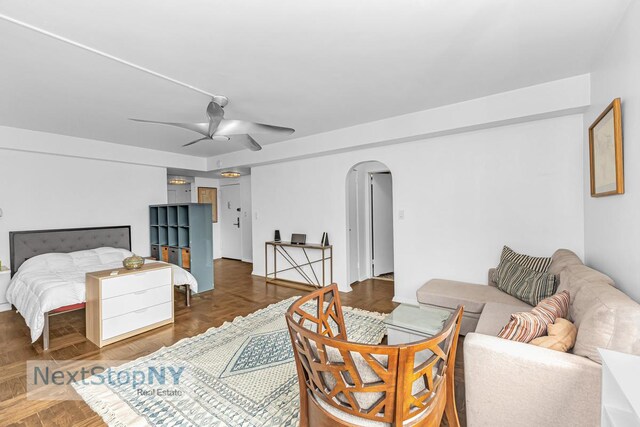 200 E 36th St Unit 13A, New York City, NY 10016 - bedroom featuring arched walkways and ceiling fan