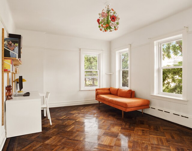 216 E 21st St, New York City, NY 11226 - living area featuring baseboard heating