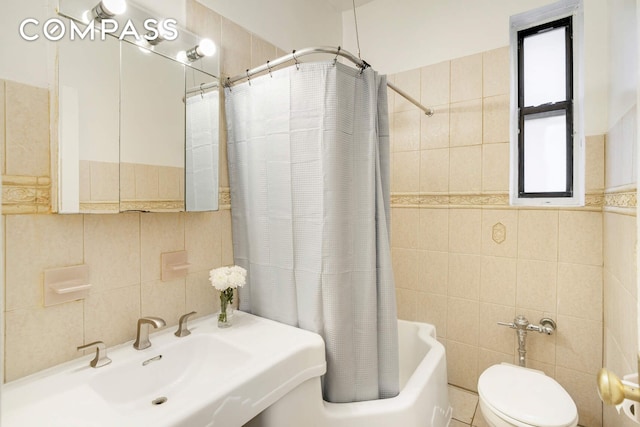 668 Riverside Dr Unit 3G, New York City, NY 10031 - full bath featuring tile walls, toilet, shower / bath combo with shower curtain, a sink, and tasteful backsplash