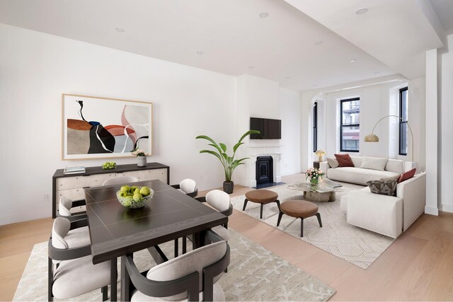 45 Cornelia St, New York City, NY 11221 - dining space featuring light wood-style flooring and baseboards
