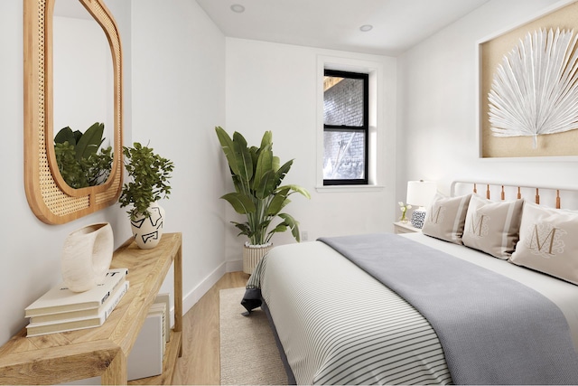 45 Cornelia St, New York City, NY 11221 - bedroom featuring light wood finished floors and baseboards