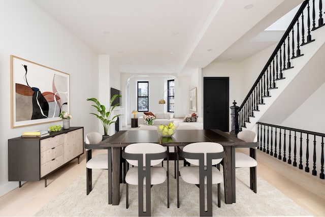 45 Cornelia St, New York City, NY 11221 - dining room featuring light wood-style flooring and stairway