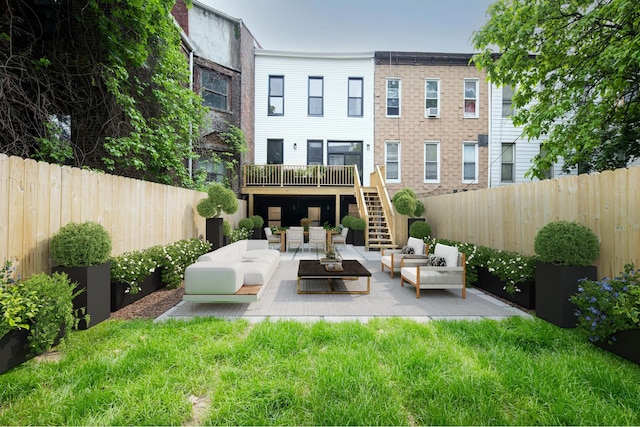 45 Cornelia St, New York City, NY 11221 - back of house featuring an outdoor living space, stairs, a wooden deck, and a patio area