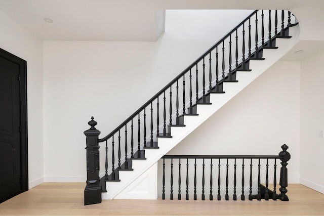 45 Cornelia St, New York City, NY 11221 - stairs featuring wood finished floors and baseboards