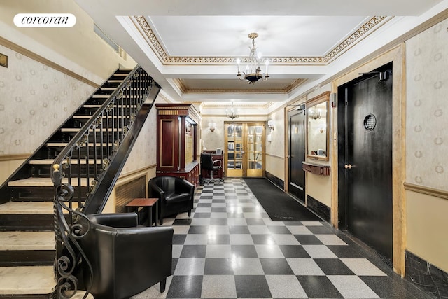 142 E 49th St Unit 2C, New York City, NY 10017 - community lobby featuring ornamental molding, wallpapered walls, stairs, and wainscoting