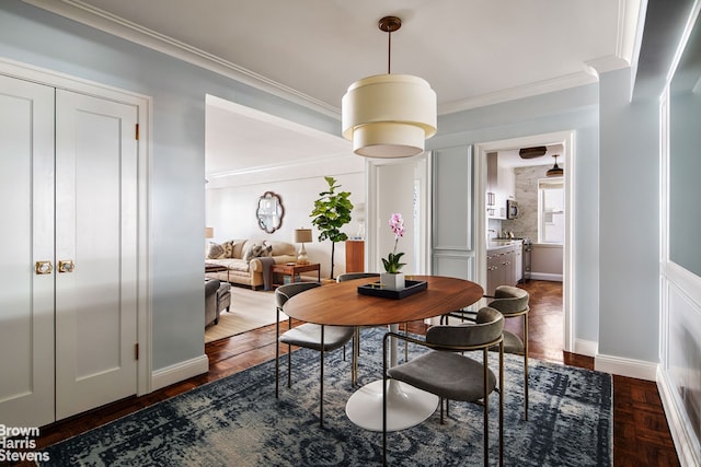 45 Sutton Pl S Unit 16/O, New York City, NY 10022 - dining space featuring crown molding and baseboards
