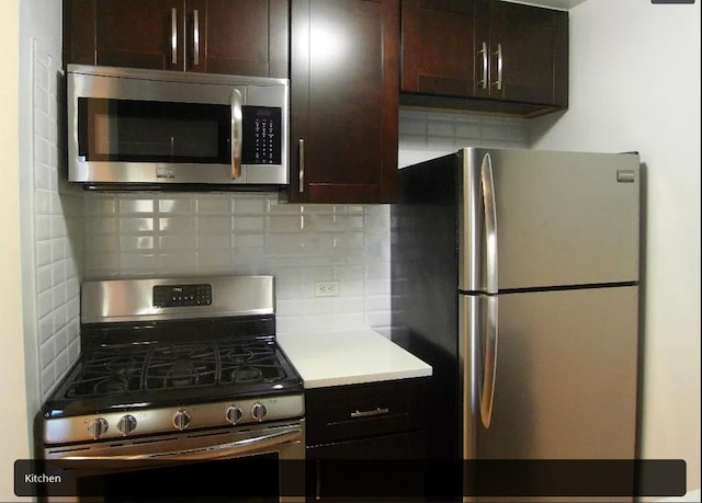 200 Rector Pl Unit 7-V, New York City, NY 10280 - kitchen featuring appliances with stainless steel finishes, decorative backsplash, dark brown cabinetry, and light countertops