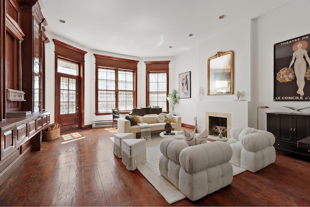 116 W 74th St, New York City, NY 10023 - living room featuring dark wood-type flooring, plenty of natural light, a fireplace, baseboards, and recessed lighting