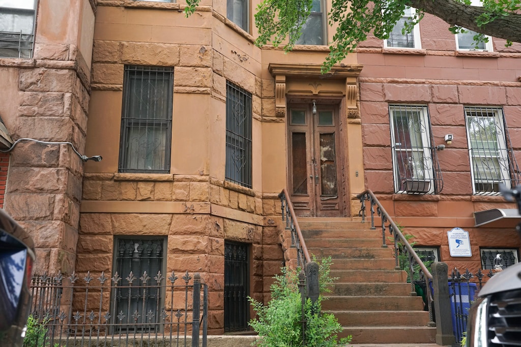 495 Bainbridge St, New York City, NY 11233 - entrance to property with french doors
