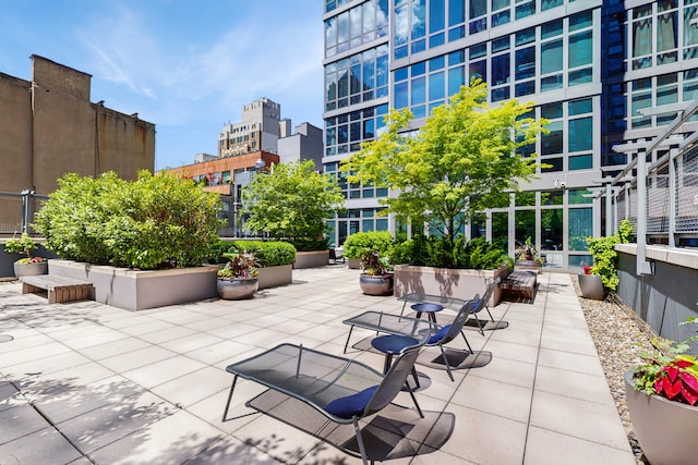 310 W 52nd St Unit 17A, New York City, NY 10019 - view of patio / terrace with a pergola