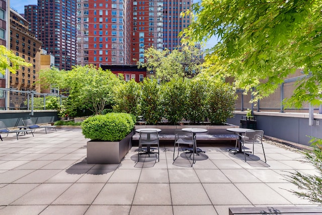 310 W 52nd St Unit 17A, New York City, NY 10019 - view of patio featuring a city view