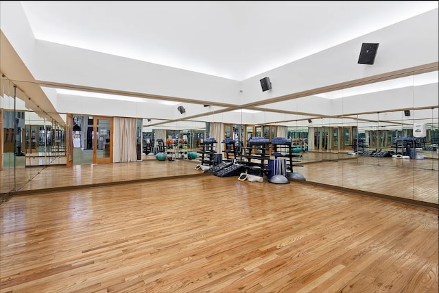 20 W St Unit 15H, New York City, NY 10004 - exercise room featuring wood finished floors