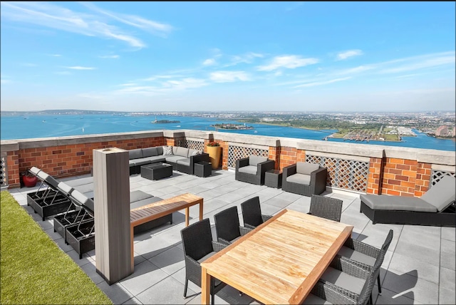 20 W St Unit 15H, New York City, NY 10004 - view of patio featuring an outdoor hangout area and a water view