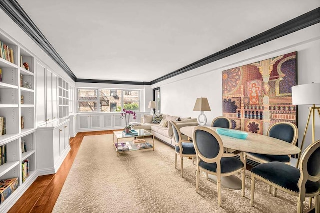 40 E 78th St Unit 6H, New York City, NY 10075 - living room featuring crown molding and wood finished floors